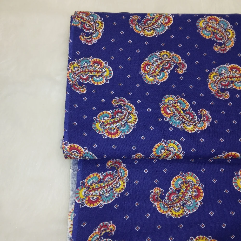 FABRIC 4 yards elaborate paisley on blue. Quarter for scale. Nice hand